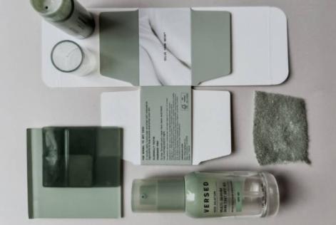 Various Versed Skincare products, laid out flat alongside FSC-certified packaging.