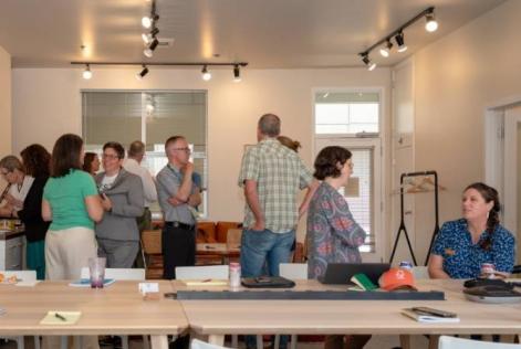 Attendees mingle and chat during an FSC networking session.