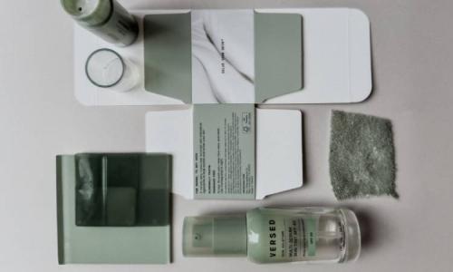 Various Versed Skincare products, laid out flat alongside FSC-certified packaging.