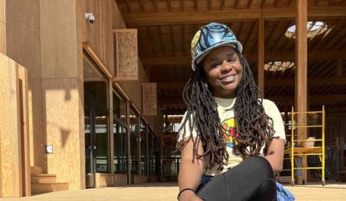 image of working in front of building